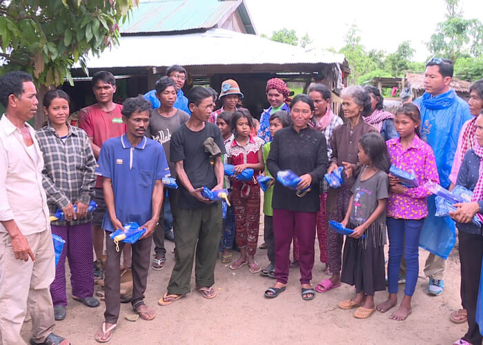 Kampong Speu Sugar Distributed raincoats and umbrellas to the communities